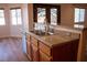Kitchen sink with granite countertops, stainless steel appliances, and a garden view at 4126 Jessica Marie St, North Las Vegas, NV 89032
