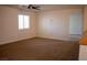Upstairs landing area features carpet flooring and a window at 4126 Jessica Marie St, North Las Vegas, NV 89032