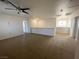 Upstairs landing with carpet flooring, several doors and a view of the chandelier at 4126 Jessica Marie St, North Las Vegas, NV 89032