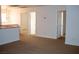 Upstairs landing with carpet flooring, several doors and a view of the chandelier at 4126 Jessica Marie St, North Las Vegas, NV 89032