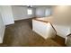 Upstairs landing featuring wood trim and carpet flooring at 4126 Jessica Marie St, North Las Vegas, NV 89032