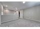 Spacious bonus room with neutral carpet, fresh paint, and ample natural light at 4206 Topaz Hills Dr, North Las Vegas, NV 89032