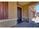 Close-up view of the front door and stone accents on the porch at 4206 Topaz Hills Dr, North Las Vegas, NV 89032