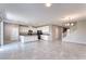 Spacious kitchen with white cabinets, island, and black appliances at 4206 Topaz Hills Dr, North Las Vegas, NV 89032