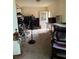 Bedroom featuring a ceiling fan, a dresser, and a door to the backyard at 4444 Denia Cir, Las Vegas, NV 89108