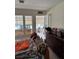 Bedroom with lots of light, view of the sun room, dresser, bed and pillows at 4444 Denia Cir, Las Vegas, NV 89108