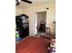 Casual dining area featuring a vintage table, black refrigerator and adjacent office area at 4444 Denia Cir, Las Vegas, NV 89108