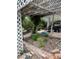 The outdoor patio has a pergola, built-in BBQ, and stone landscaping at 4444 Denia Cir, Las Vegas, NV 89108