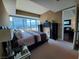 Serene bedroom boasting floor-to-ceiling windows that offer a breathtaking view and plenty of natural light at 4525 Dean Martin Dr # 2203, Las Vegas, NV 89103