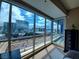 Bedroom with floor-to-ceiling windows showcasing views of the city skyline at 4525 Dean Martin Dr # 2203, Las Vegas, NV 89103