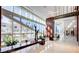 Modern lobby with high ceilings, plants and bench seating at 4525 Dean Martin Dr # 2203, Las Vegas, NV 89103