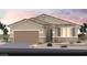 Charming single-story home with a tile roof, desert landscaping, and a two-car garage at 4720 Tindra Ave # Lot 16, Las Vegas, NV 89121