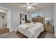Well-lit bedroom featuring a bed, closet, bedside tables, and a bright window with pleasant views at 5234 Tulip Hill Ave, Las Vegas, NV 89141
