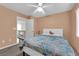 Inviting bedroom featuring carpeted floors, warm wall paint, and direct access to the loft at 5234 Tulip Hill Ave, Las Vegas, NV 89141