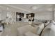 Open living space featuring updated kitchen, dining area, and comfortable living room with modern finishes at 5234 Tulip Hill Ave, Las Vegas, NV 89141