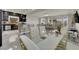 Open living space featuring updated kitchen, dining area, and comfortable living room with modern finishes at 5234 Tulip Hill Ave, Las Vegas, NV 89141