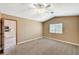 Spacious bedroom with vaulted ceilings and direct access to the kitchen at 5401 Broadwater Ln, Las Vegas, NV 89130