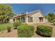 Charming single-story home featuring stucco siding, well-manicured landscaping, and a cozy, inviting atmosphere at 5401 Broadwater Ln, Las Vegas, NV 89130