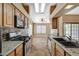 Kitchen with modern appliances and breakfast nook at 5401 Broadwater Ln, Las Vegas, NV 89130
