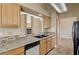Spacious kitchen with granite countertops and stainless steel dishwasher at 5401 Broadwater Ln, Las Vegas, NV 89130