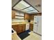 Traditional kitchen featuring wooden cabinets, standard white appliances, and ample lighting at 5576 W Rochelle Ave # 27A, Las Vegas, NV 89103