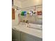 Functional laundry room equipped with a washer, dryer, and shelving at 5576 W Rochelle Ave # 27A, Las Vegas, NV 89103