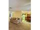 Expansive living room flowing into the dining area and kitchen, creating an open and inviting floor plan at 5576 W Rochelle Ave # 27A, Las Vegas, NV 89103