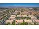 Detailed aerial view of a townhome community featuring well-maintained landscaping and multiple buildings at 5855 Valley Dr # 2106, North Las Vegas, NV 89031