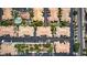 Planned community showcasing attractive townhomes with parking, trees, and pool at 5855 Valley Dr # 2106, North Las Vegas, NV 89031