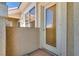 Exterior view of a private balcony with a door, offering a seamless transition to outdoor living at 5855 Valley Dr # 2106, North Las Vegas, NV 89031
