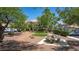 Charming community featuring lush landscaping, a picnic table, and well-maintained lawns at 5855 Valley Dr # 2106, North Las Vegas, NV 89031