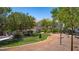 Serene community featuring lush landscaping, walking path, and well-maintained lawns at 5855 Valley Dr # 2106, North Las Vegas, NV 89031