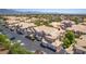 Charming townhome showcases a tile roof, attached garage, and nearby parking at 5855 Valley Dr # 2106, North Las Vegas, NV 89031