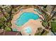 An aerial view of the community pool, jacuzzi, tables, and chairs at 5855 Valley Dr # 2106, North Las Vegas, NV 89031