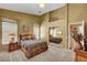 Comfortable bedroom featuring carpet, natural light from windows, and mirrored closet doors at 5933 Perfect View St, Las Vegas, NV 89130