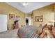 Inviting bedroom with neutral tones, natural light, and a comfortable bed at 5933 Perfect View St, Las Vegas, NV 89130