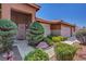 Charming home exterior featuring well-manicured landscaping and a welcoming entrance at 5933 Perfect View St, Las Vegas, NV 89130