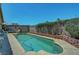 A private swimming pool with lush greenery, perfect for relaxing or entertaining at 5933 Perfect View St, Las Vegas, NV 89130