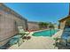 Inviting backyard pool area with lounge chairs and a serene, private setting at 5933 Perfect View St, Las Vegas, NV 89130