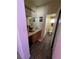 Bathroom featuring wood-style floors and a single vanity at 6329 Kitamaya St, North Las Vegas, NV 89031