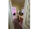 Bathroom view featuring light wood cabinets and a pink painted room at 6329 Kitamaya St, North Las Vegas, NV 89031
