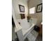 Clean white bathtub with tile surround and window at 6329 Kitamaya St, North Las Vegas, NV 89031