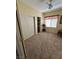 Bedroom featuring plush carpet, ceiling fan, and neutral colored walls at 6329 Kitamaya St, North Las Vegas, NV 89031