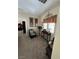 Sitting room featuring carpet, neutral colored walls, and decor at 6329 Kitamaya St, North Las Vegas, NV 89031
