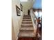 Carpeted staircase leading to the upper level of the home at 6329 Kitamaya St, North Las Vegas, NV 89031