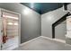 Basement room with access to the garage and painted walls at 6533 Sundown Heights Ave, Las Vegas, NV 89130