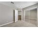 Bedroom with neutral colored walls and mirrored closet doors at 6533 Sundown Heights Ave, Las Vegas, NV 89130