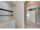 Bedroom entrance with mirrored closet doors and built-in shelving unit providing lots of storage at 6533 Sundown Heights Ave, Las Vegas, NV 89130