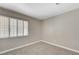 Bedroom featuring neutral carpet and window with shutters at 6533 Sundown Heights Ave, Las Vegas, NV 89130