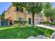 A cozy two-story home with a lush lawn, a fenced yard, and an attached two-car garage at 6533 Sundown Heights Ave, Las Vegas, NV 89130
